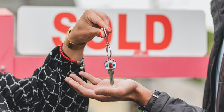 house sold giving keys over